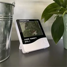 Izoxis időjárásmérő állomás, óra, hő és páratartalom mérő Izoxis időjárásmérő állomás, óra, hő és páratartalom mérő